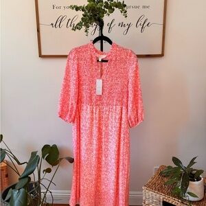 Beautiful vibrant, pink and cream superfoxx dress NWT